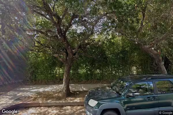 Street view of Schindler House showing its entrance and surroundings