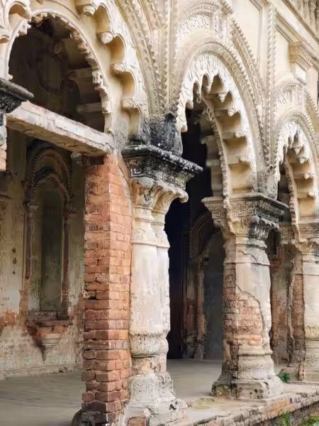 Detailed view of ancient stone arches showcasing intricate architectural design and patterns.