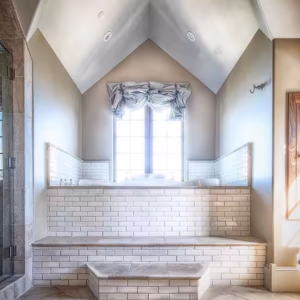 Rustic walk-in shower with natural stone and wood accents