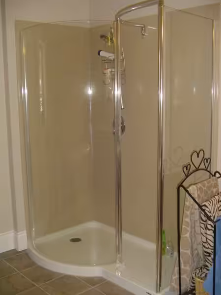 Walk-in shower in a compact bathroom