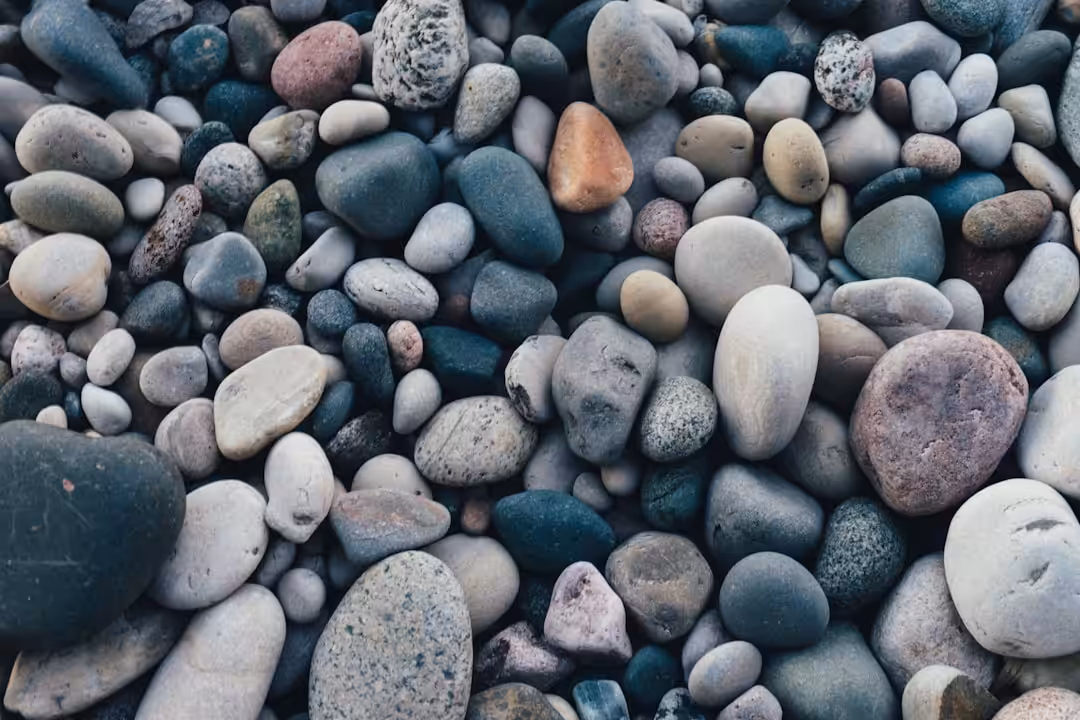 Mixed stones collection showcasing a variety of textures and colors.