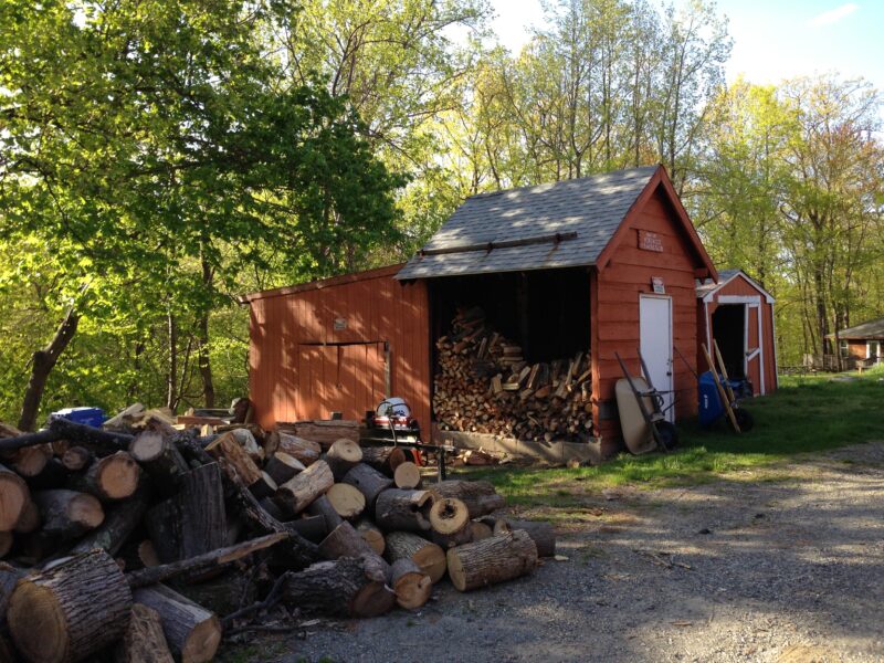 Wooden sheds located at a camp, showcasing practical designs for various storage needs.