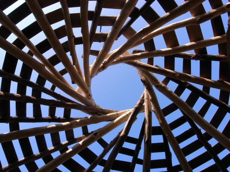 An artistic angle showcasing reciprocal roof decking, a unique roofing design technique.