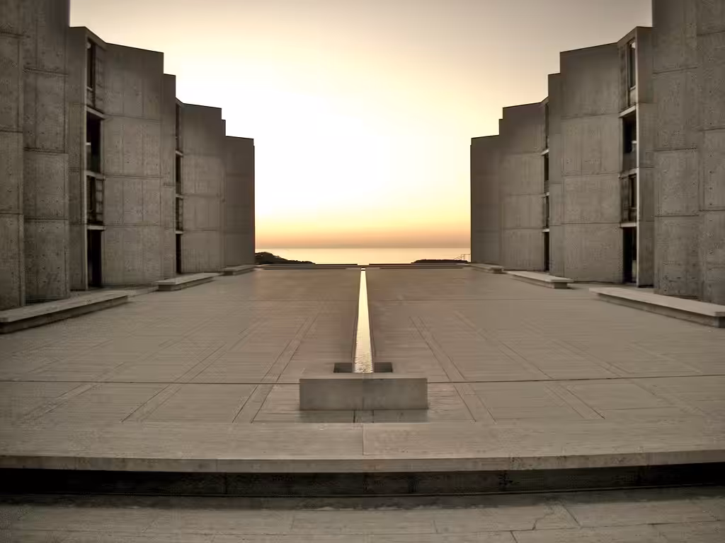 Another view of the Salk Institute highlighting its concrete structure and design elements.