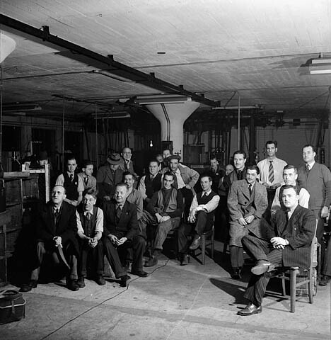 Workmen at a Canadian film studio set