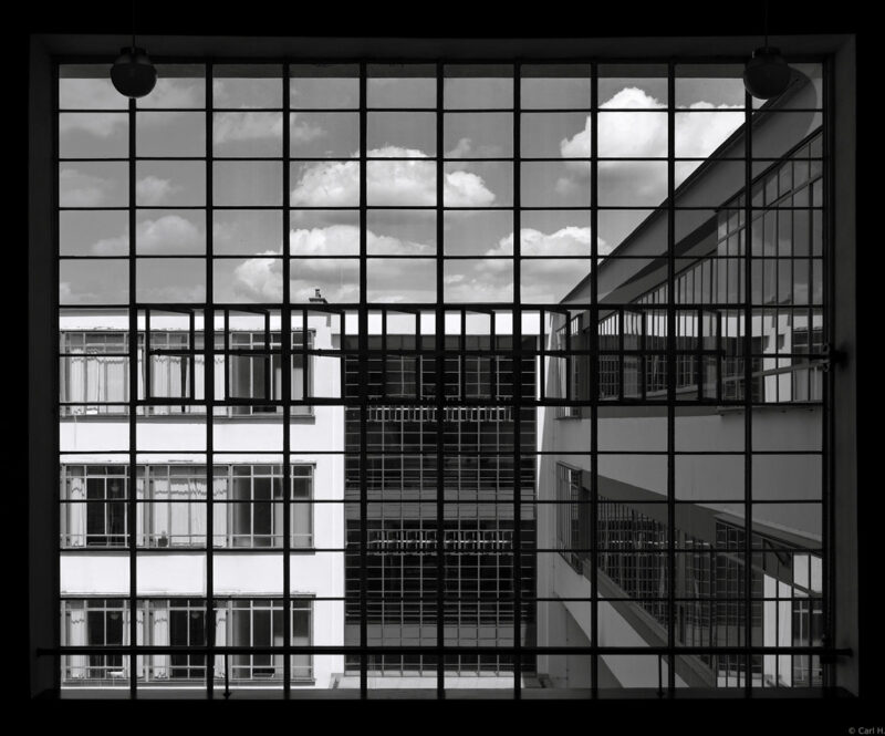 Open skies over a modernist Bauhaus-inspired cityscape.