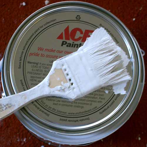 Applying exterior primer and paint to trim