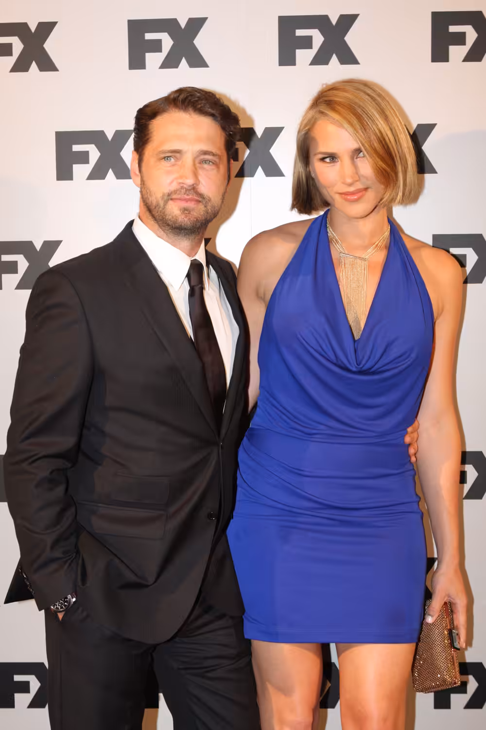 Jason Priestley and Naomi Lowde-Priestley smiling together
