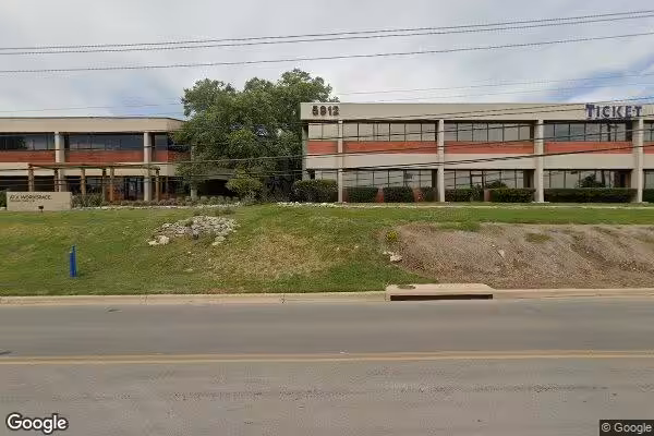 Streetview of concrete sidewalk slab repair in Austin