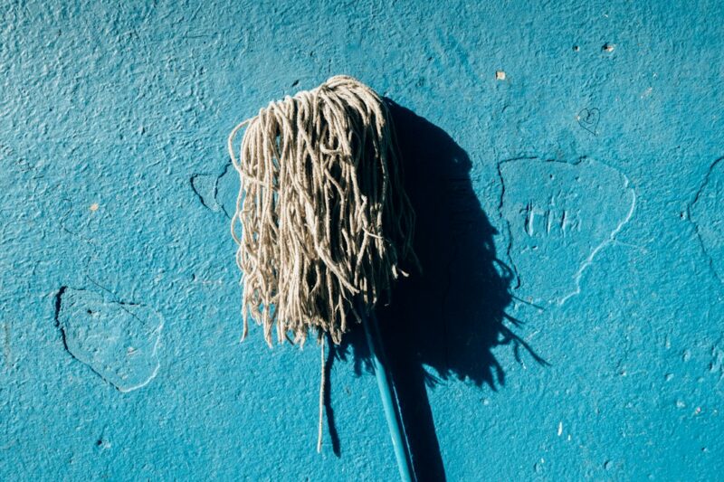 blue and black paint on blue wall