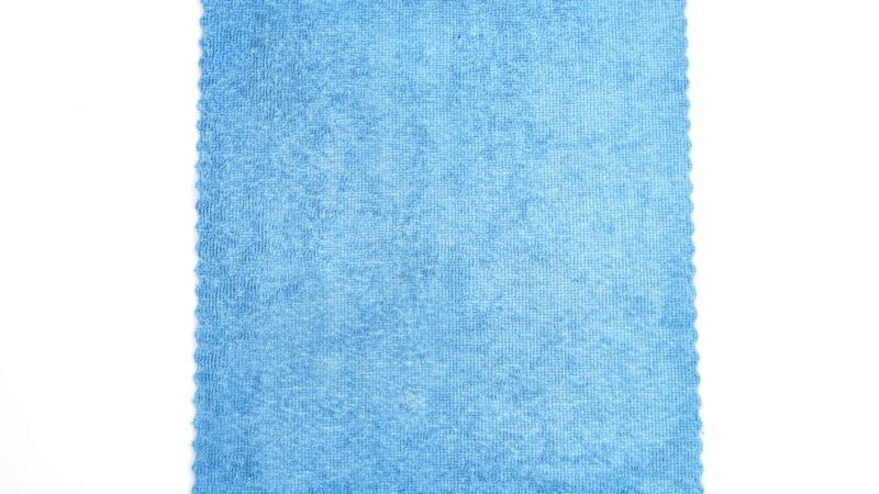 a blue rug with a white background