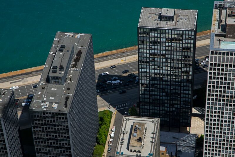 an aerial view of a city with tall buildings