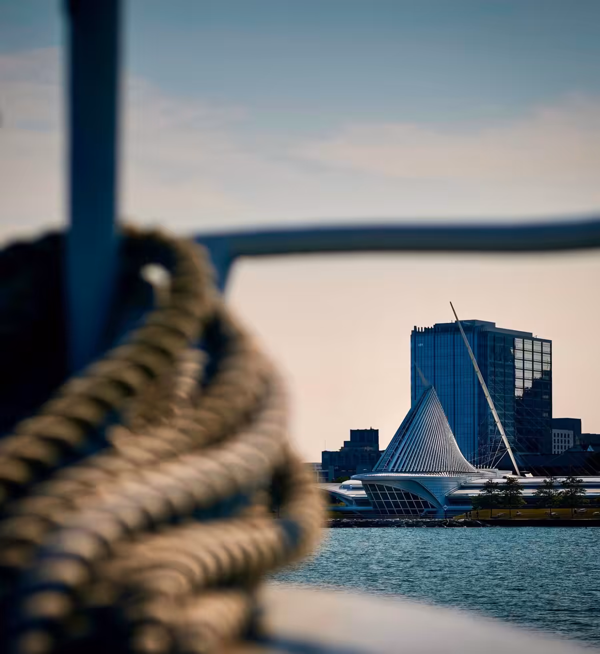 View of Milwaukee Art Museum with foreground focus on boat